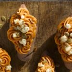 Twice Baked Maple Chipotle Sweet Potatoes with Goat Cheese & Pumpkin Seeds